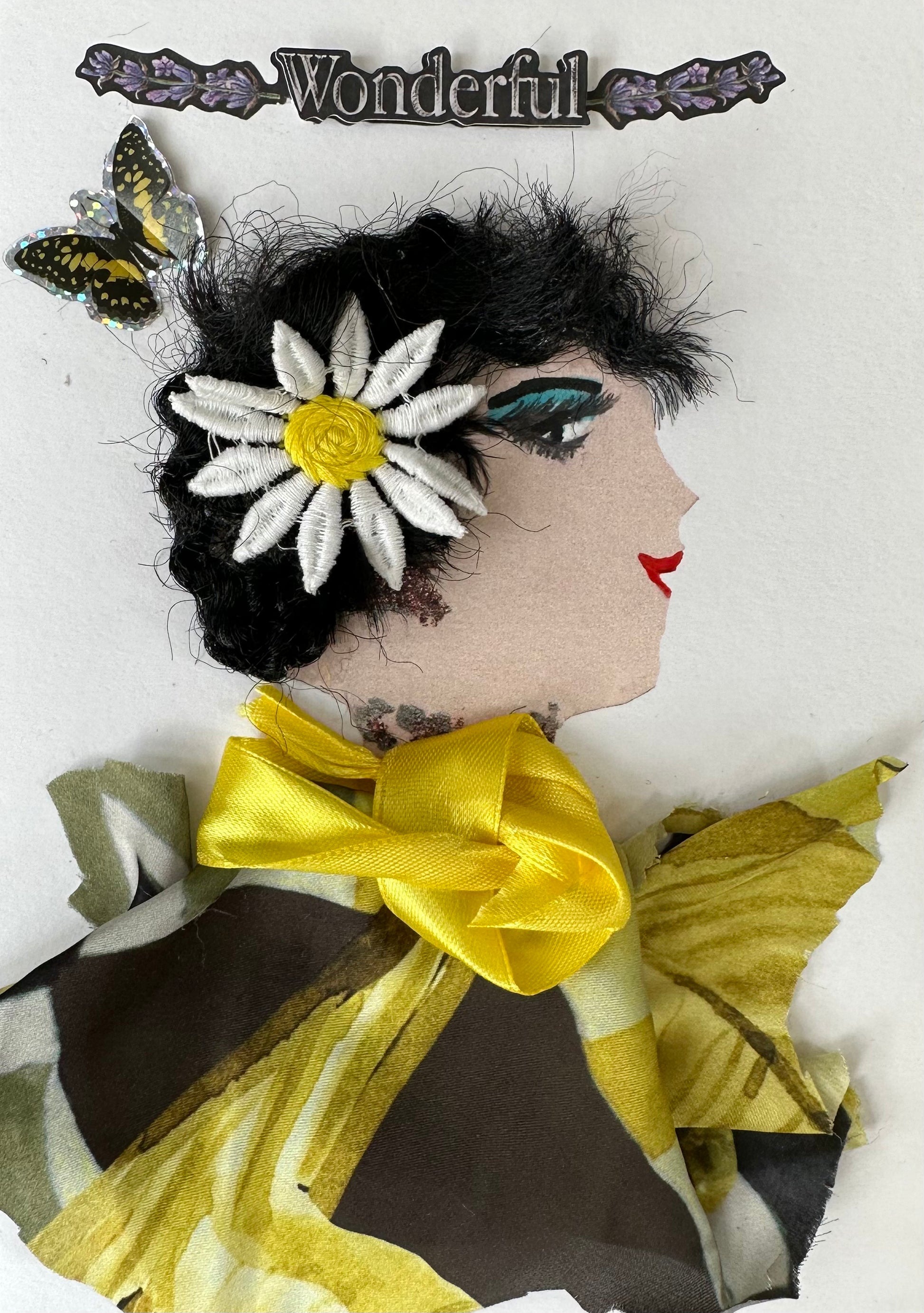 I designed this card for Wonderful Waverly. She is a woman wearing a yellow and brown blouse. Her black hair is tied together with a large daisy and a butterfly soars next to her. The top of the card reads "Wonderful". 